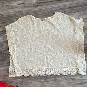 Lace, sheer cream colored top